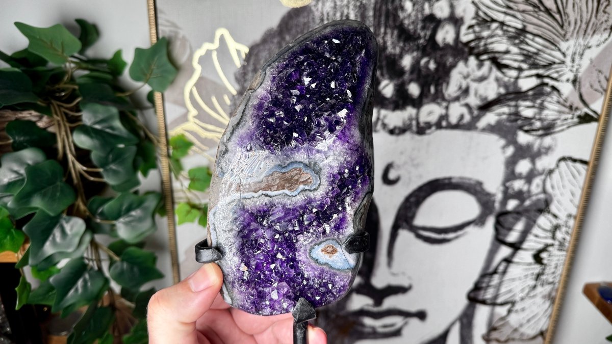 A beautiful, sparkling Amethyst crystal cluster, the official purple birthstone for February.