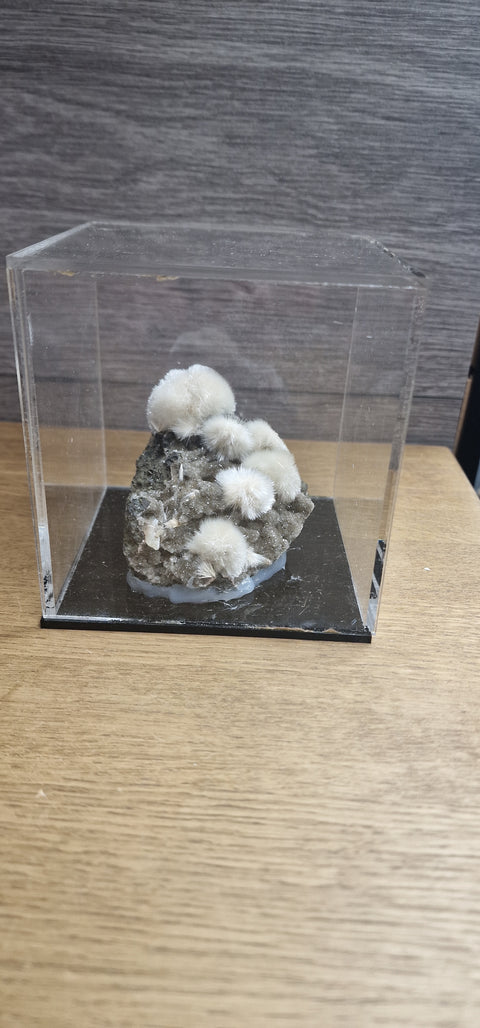 Mesolite on Black Sparkling Chalcedony in Display Cases