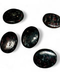 Garnet in Tourmaline Palm Stones: Energizing Crystals - Crystals & Reiki