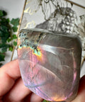 Polished Pink Labradorite freeform showing purple, orange, gold, and green highlights – Crystals & Reiki.
