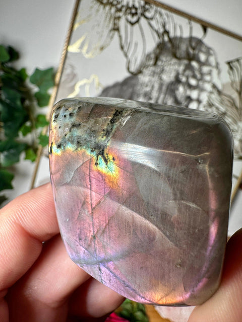 Polished Pink Labradorite freeform showing purple, orange, gold, and green highlights – Crystals & Reiki.